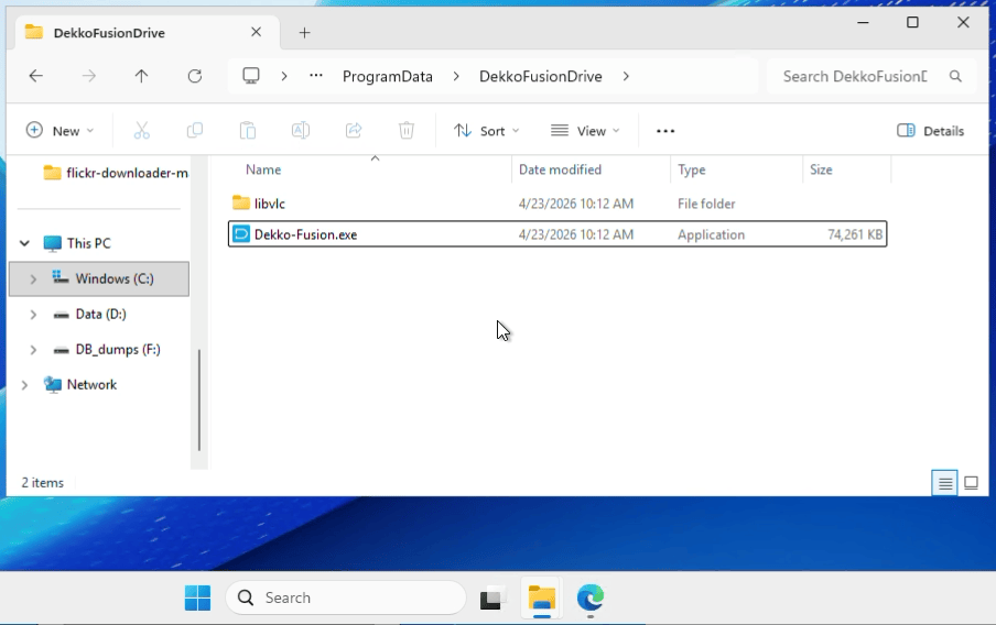 Windows File Explorer showing the DekkoFusionDrive folder in ProgramData, containing the libvlc folder and Dekko-Fusion.exe, which is selected for pinning to the taskbar.