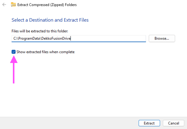 Windows Extract dialog with the destination set to C:\\ProgramData\\DekkoFusionDrive and the "Show extracted files when complete" box ticked, with an arrow pointing to it.