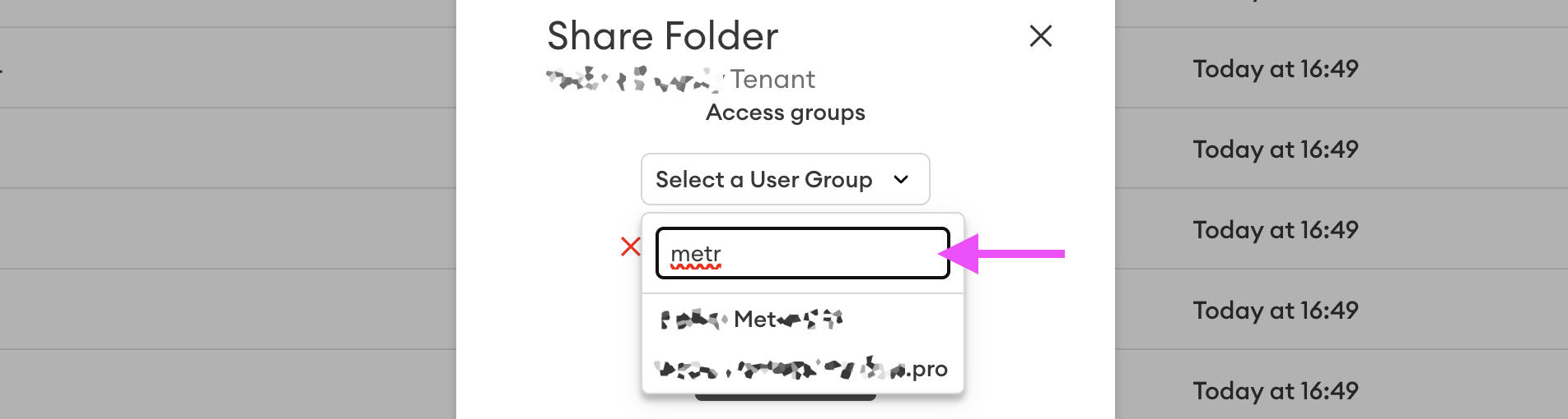 Share Folder dialog with the "Select a User Group" dropdown open, search field containing "metr" and an arrow pointing to it, with matching group results listed below.